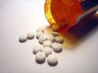 Image displays a tube of Pills which are meant to represent steroids